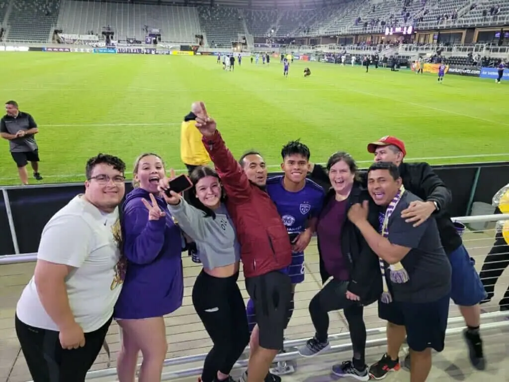 Validia and friends at a soccer game.