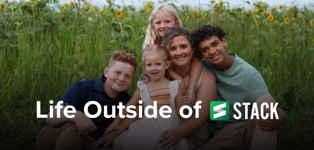 Megan Britton, Campaign Coordinator, and her four children pose outside. The image says "Life Outside of STACK"